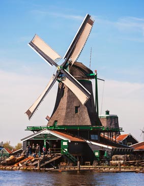 Windmill next to water